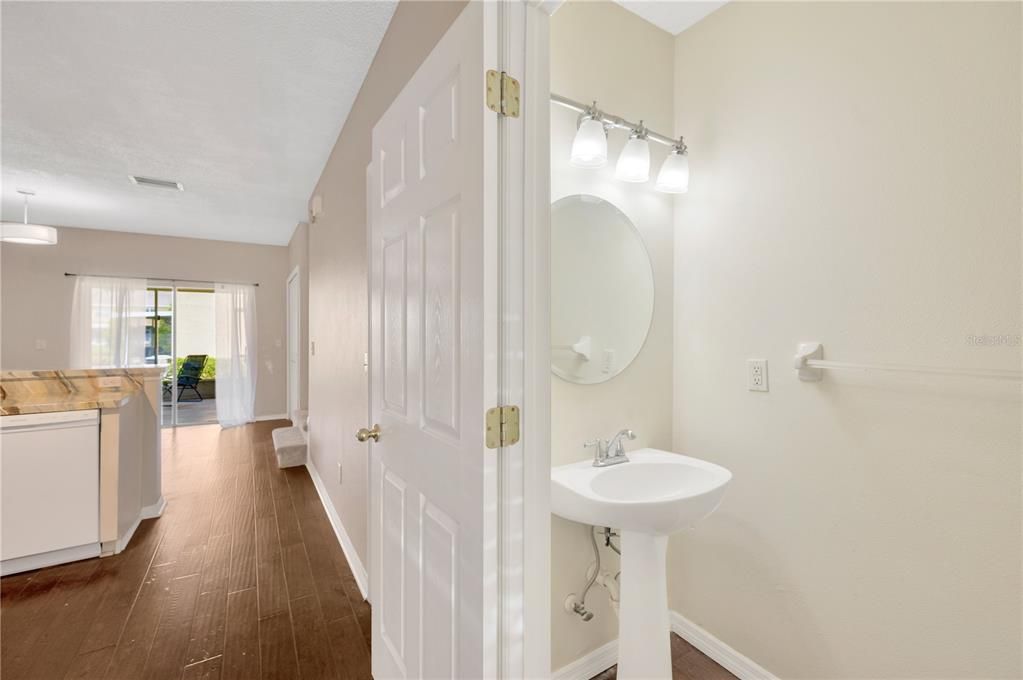 1st floor features a half bath for convenience.