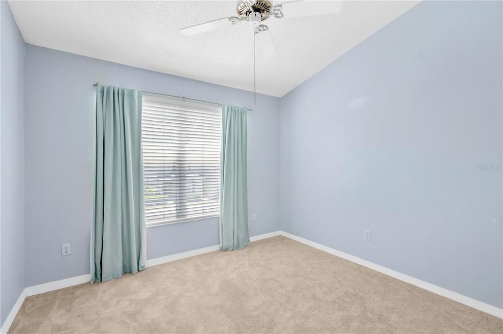 Bedroom # 3 is 11' x 10' and has cathedral ceiling with fan and a standard built-in closet.