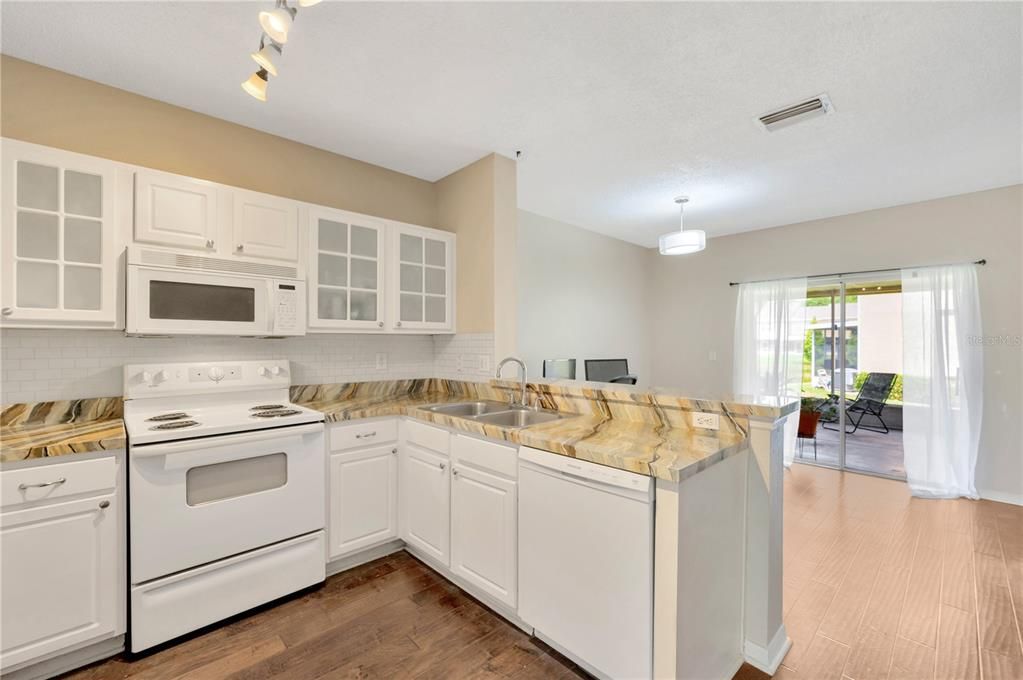 The kitchen's breakfast bar makes meal prep a breeze.