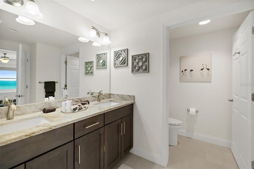 Double sinks and granite counters in primary bath