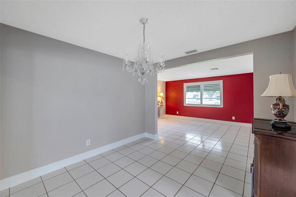 Dining area with living room in the background.