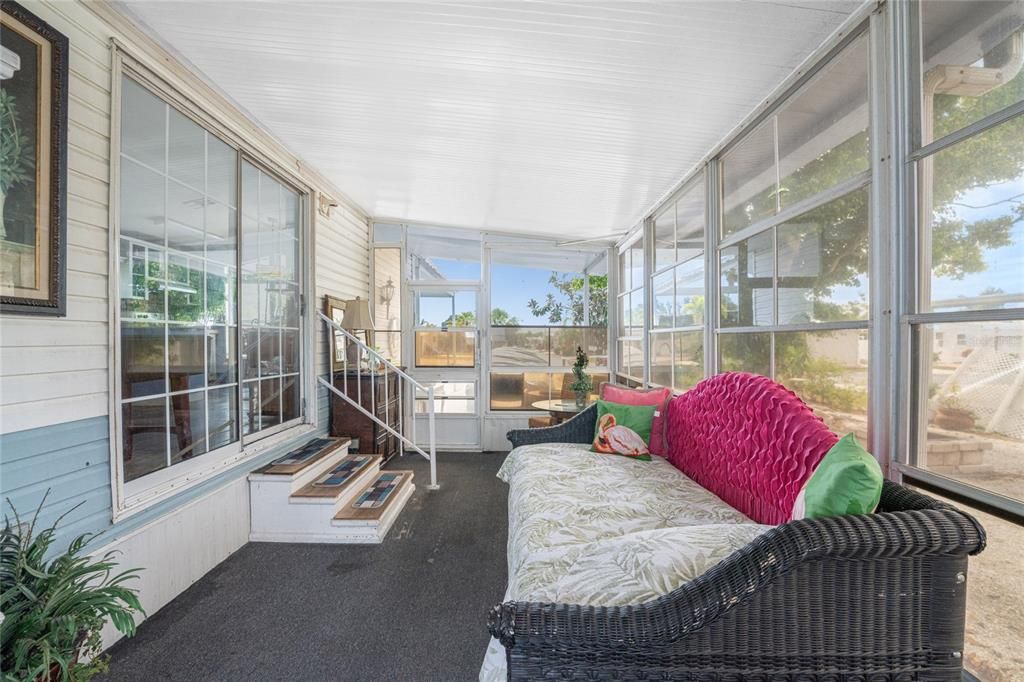 Sliding Glass Doors From The Living Room Onto The Lanai.