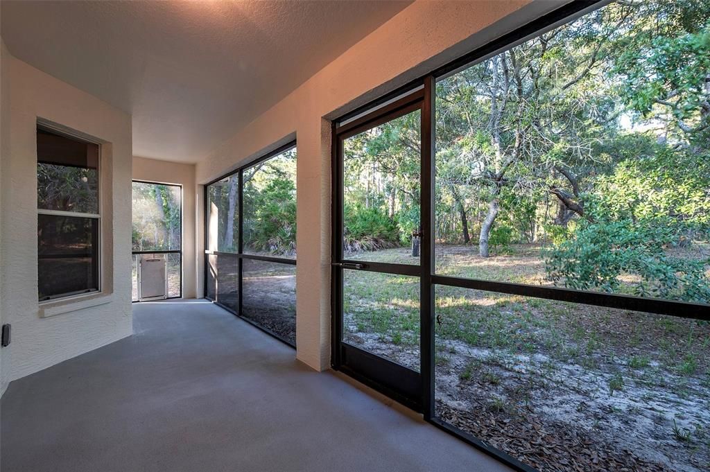 Large Screened Lanai off of the Living Room with breathtaking nature views!