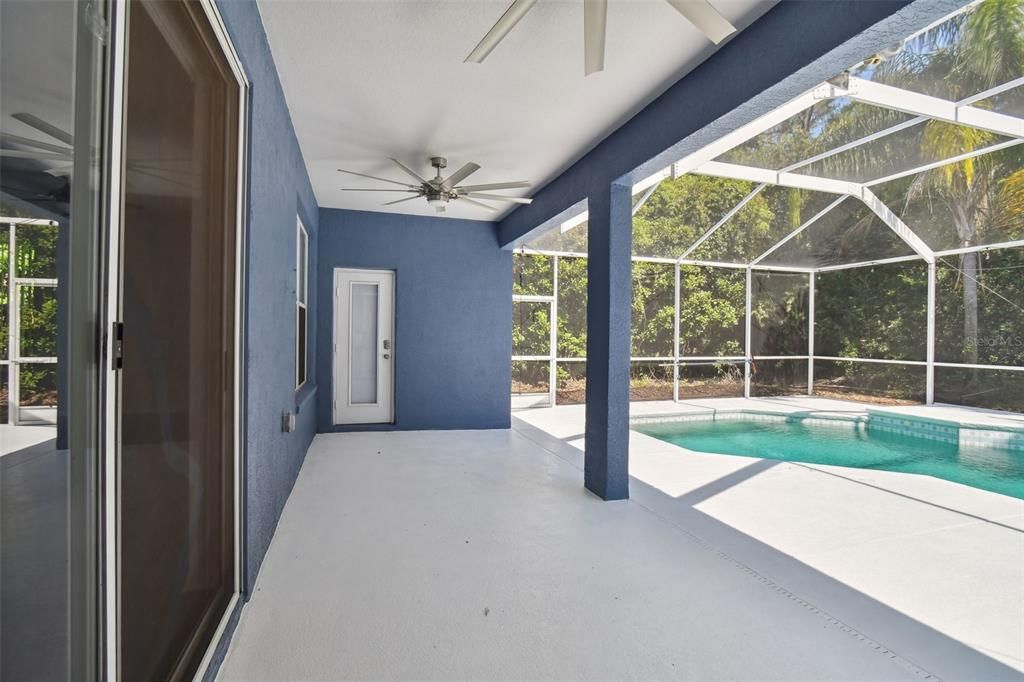 Covered / Screened Lanai with door to pool bath