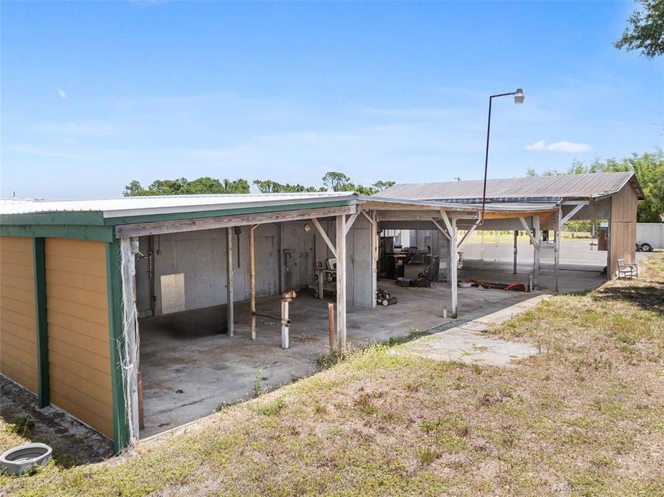 BACK SHOWING CARPORTS