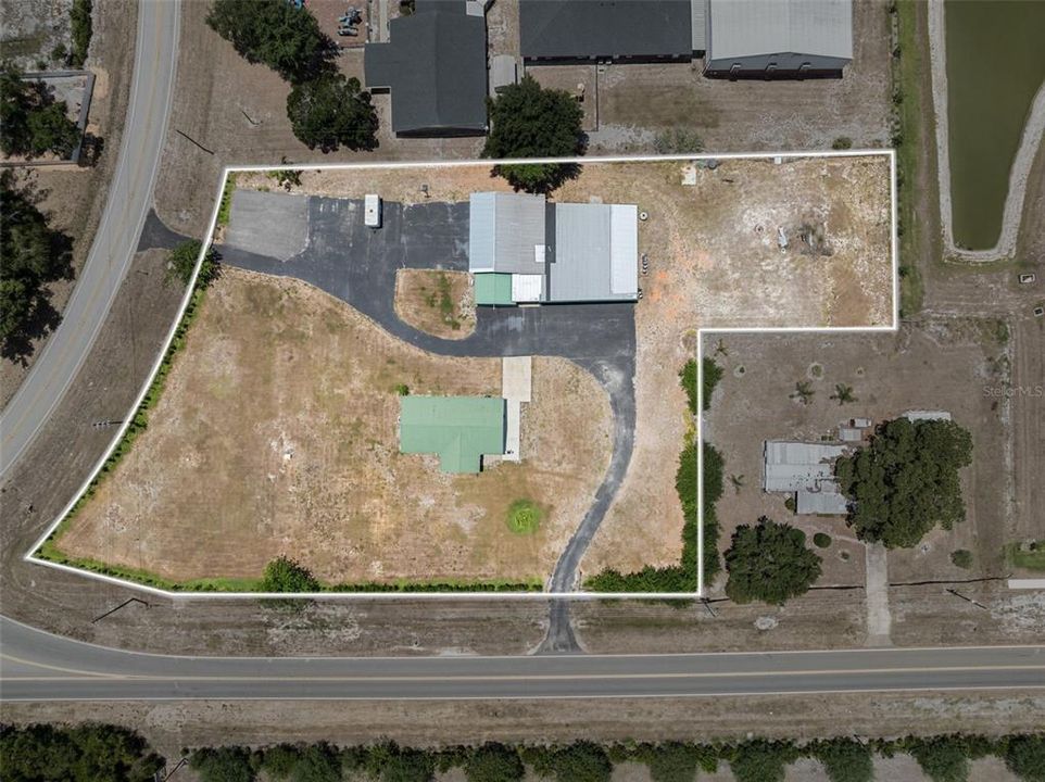 AERIAL OUTLINED VIEW OF PROPERTY