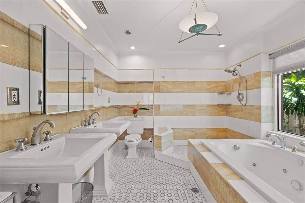 Relax in 3 beautifully updated bathrooms. Primary bathroom features onyx and marble walls.