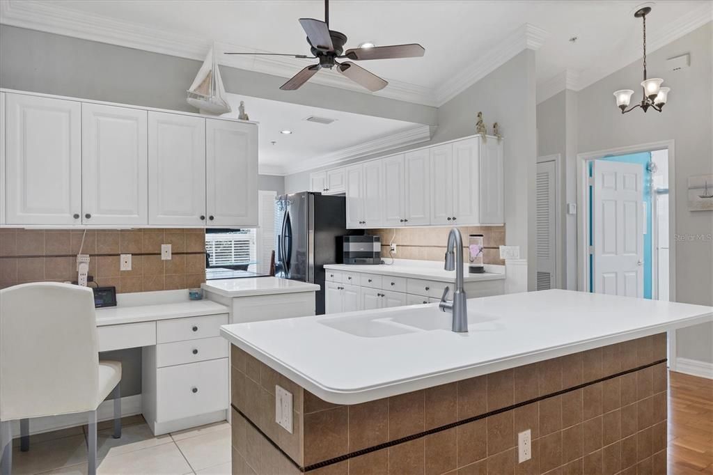 Kitchen with Island with seating for 4 available, built in desk area