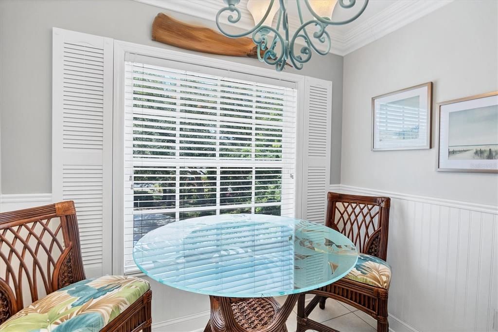 breakfast nook with large window in kitchen