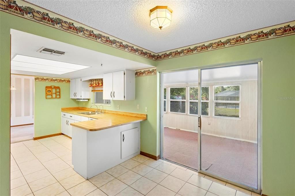 Kitchen looking into Florida room