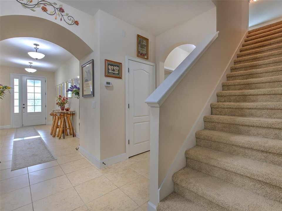 Stairway to second level playroom/dual master bedroom/media room Your choice.