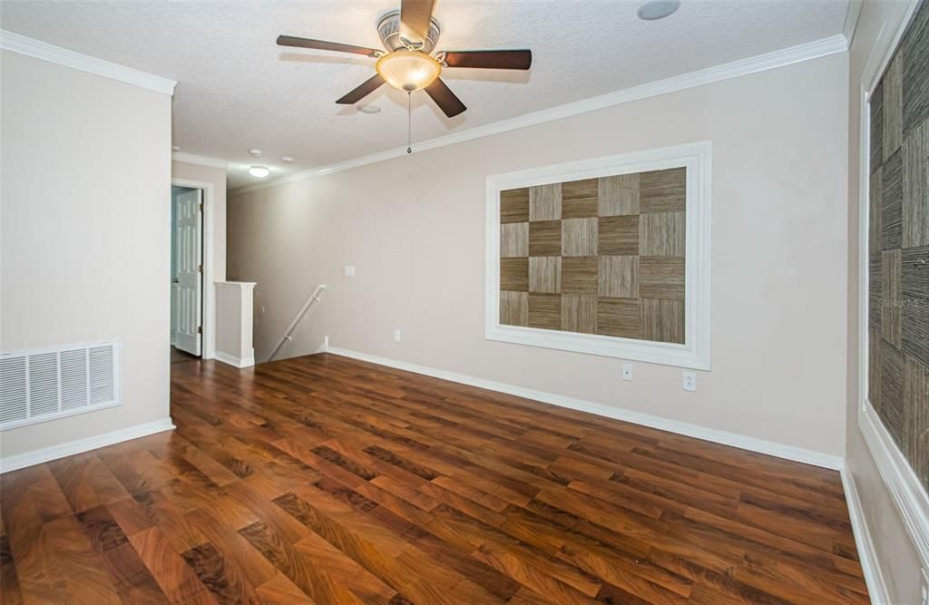 Landing area upstairs that can be used as a sitting area or office