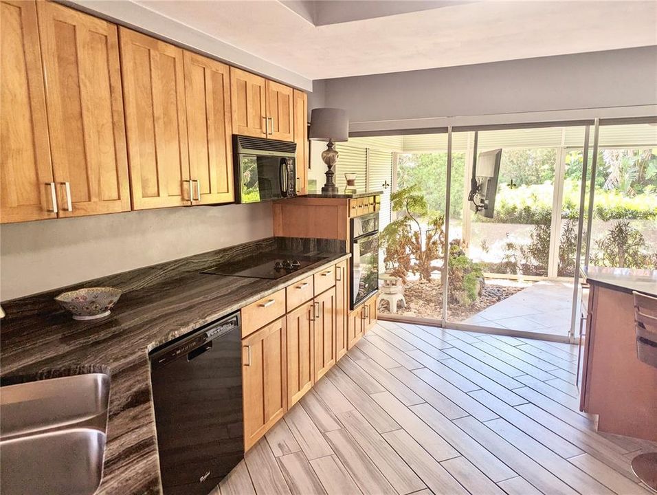 view of the screened in porch from the kitchen