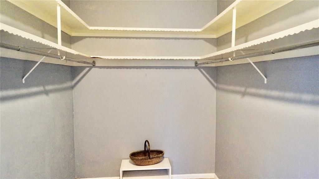 walk-in closet in primary bedroom