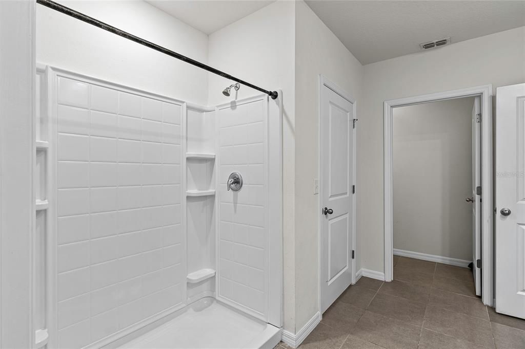 Primary Bathroom-Shower and Toiler Room