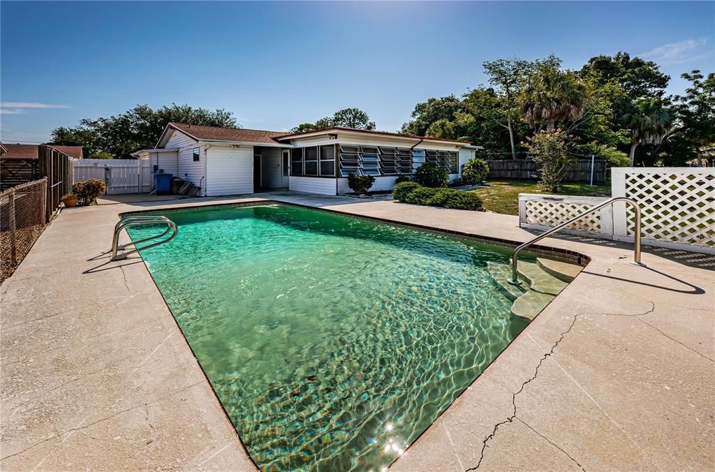 Pool sits perpendicular on the lot