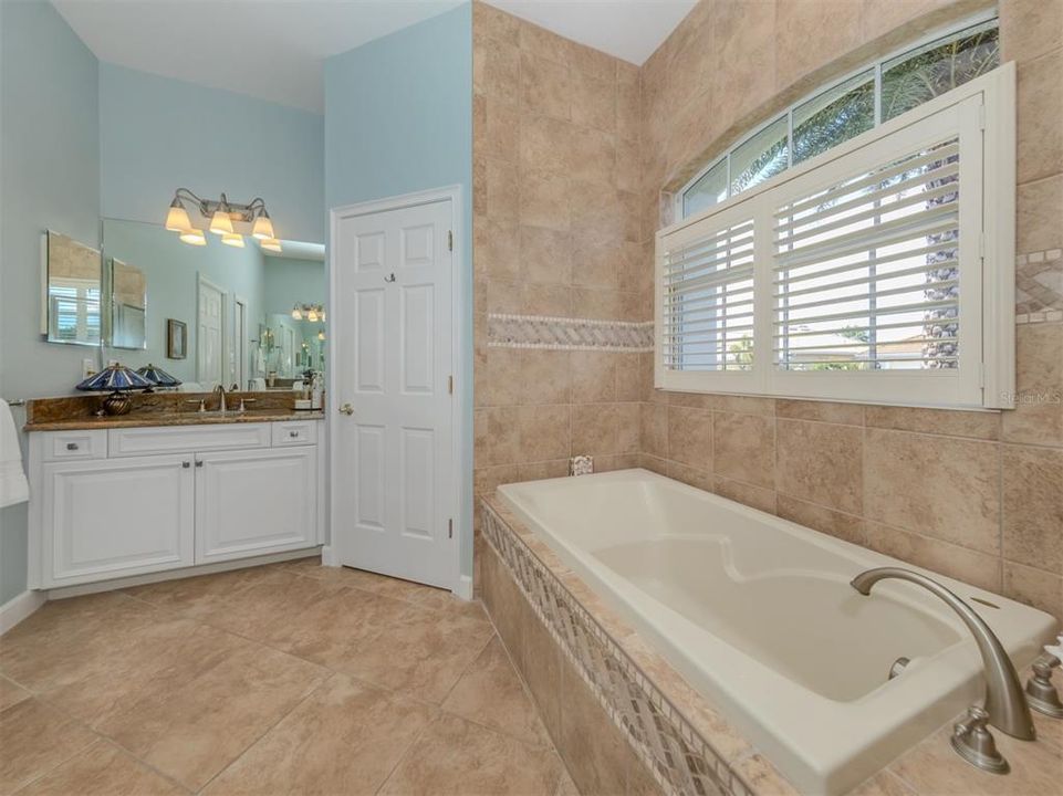 The master ensuite offers plenty of space for two to get ready