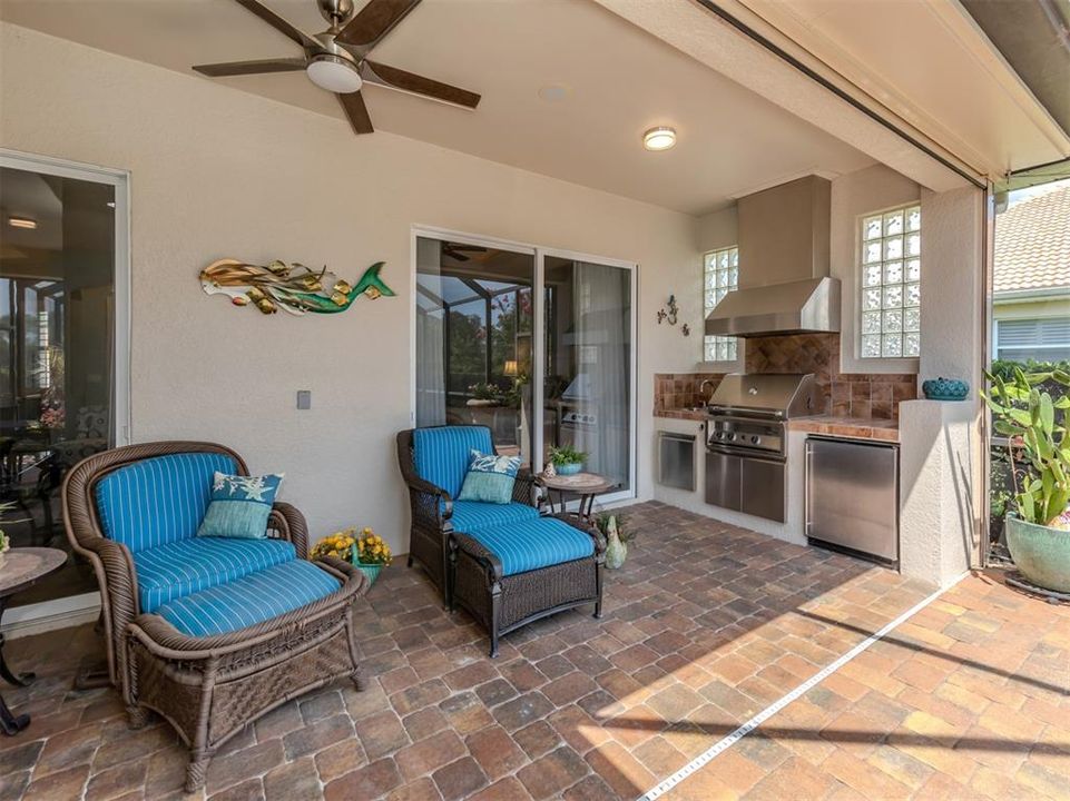 You will love this outdoor kitchen and entertaining space on the lanai.