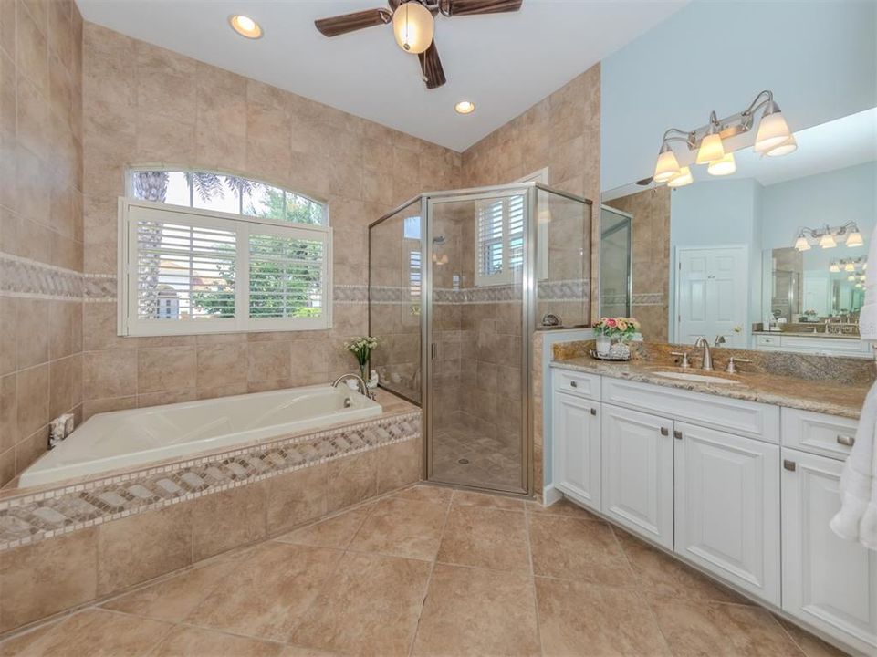 The master ensuite has dual sinks, garden tub and walk in shower