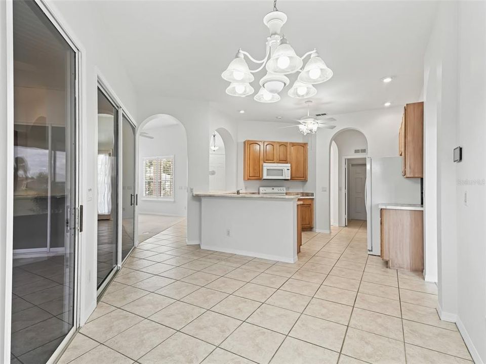 Open kitchen w/2 sets of sliding glass doors to lanai