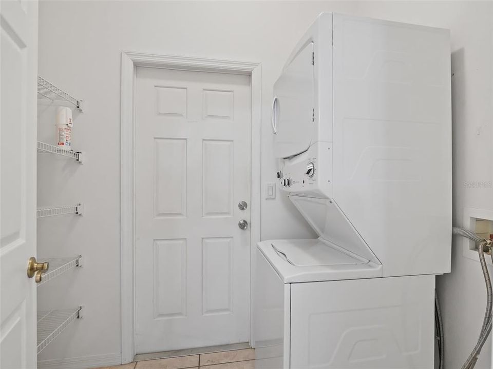 Inside laundry room w/new washer & dryer