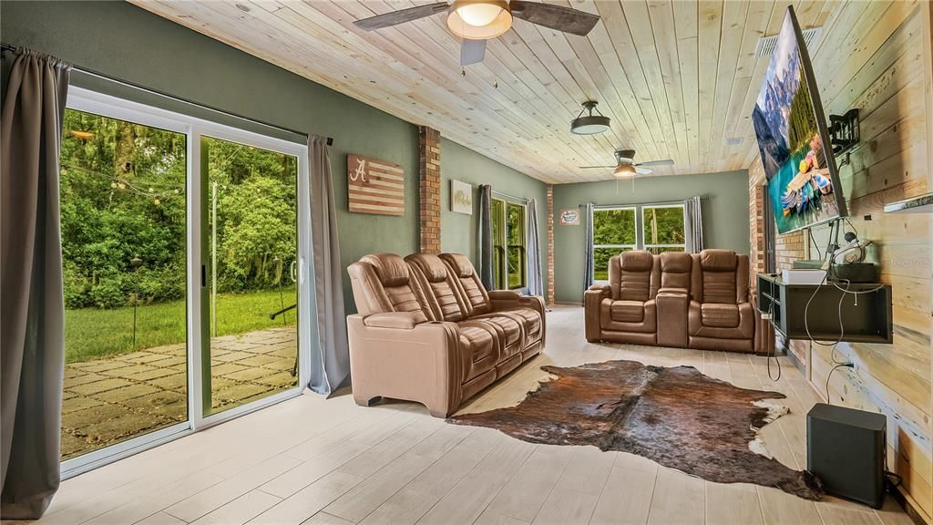 bonus room/living room sliders to backyard