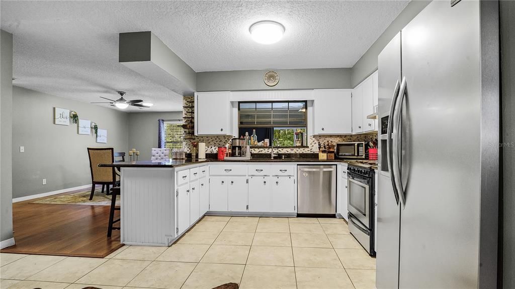 kitchen. gas range, stainless steel appliances