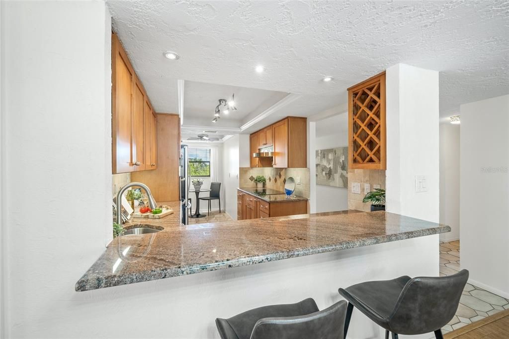 Looking over the bar into the kitchen.