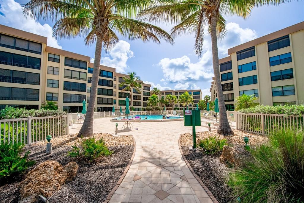 Walking out of your building and out to the pool, shuffle board and the beach.