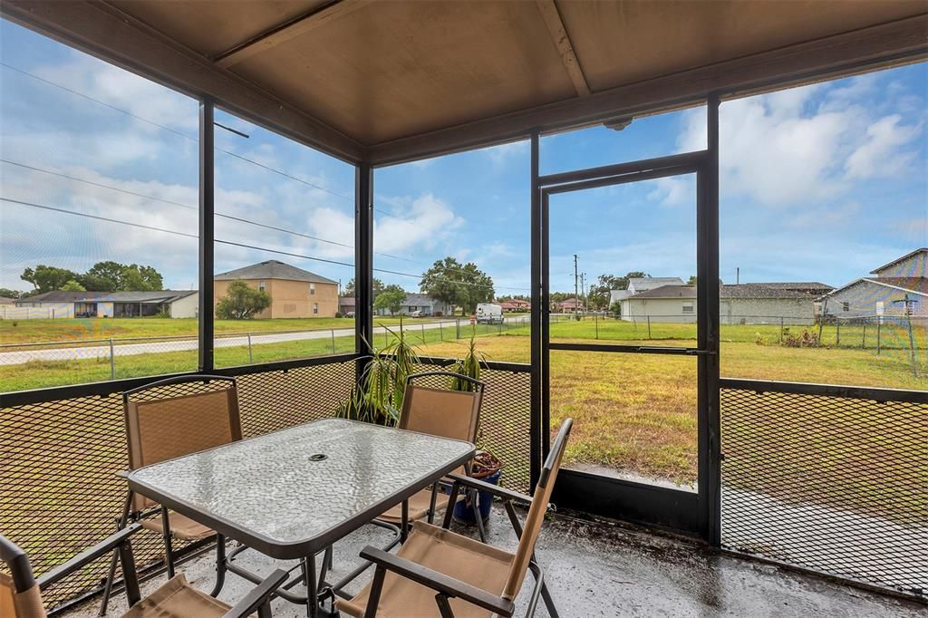 Left side screened-in lanai. There is an exact copy on the adjacent unit.