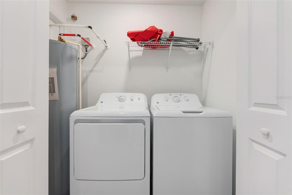 Brand new washer and dryer in laundry closet