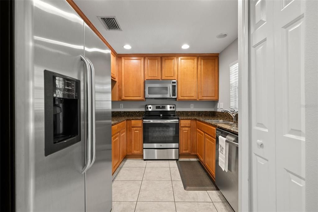 Side by side refrigerator with water and ice dispenser