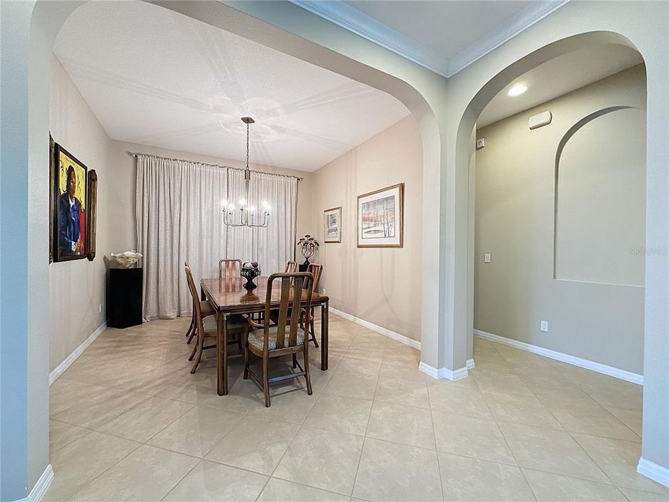 DINING ROOM and entrance to Primary Bedroom and Bath