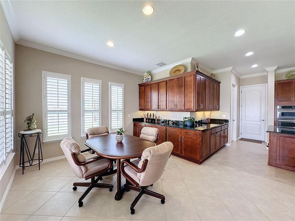 More cabinetry and entertaining space