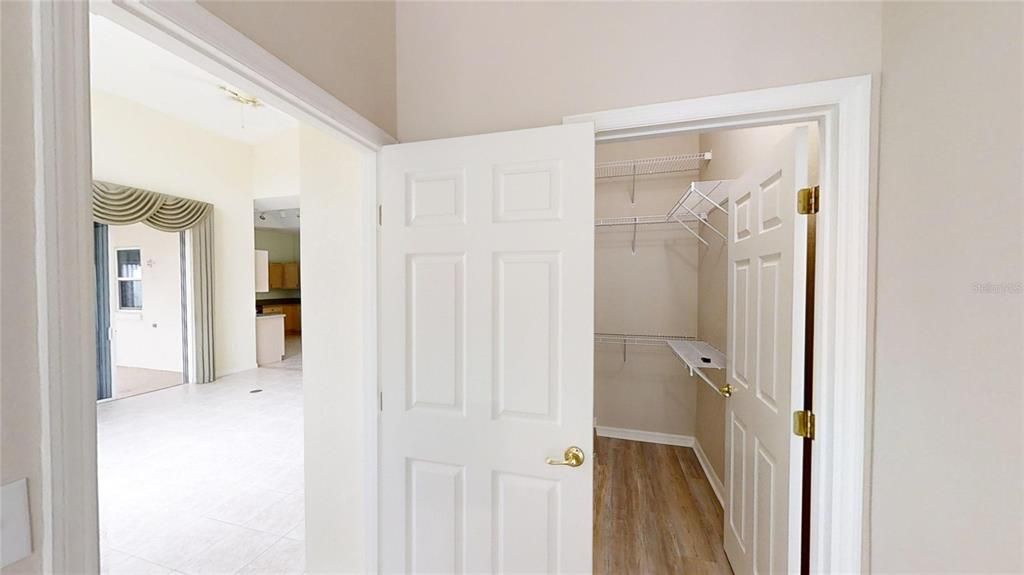 PRIMARY BEDROOM WALK-IN CLOSET