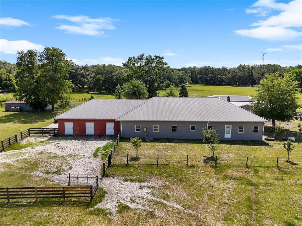 In-law House with attached horse barn, feed prep kitchen, and office