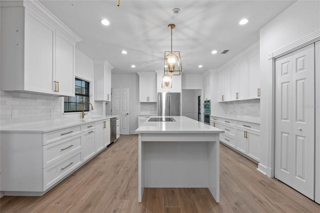 New Gourmet Kitchen with Quartz Countertops, Stainless Steel Appliances, Large Center Island