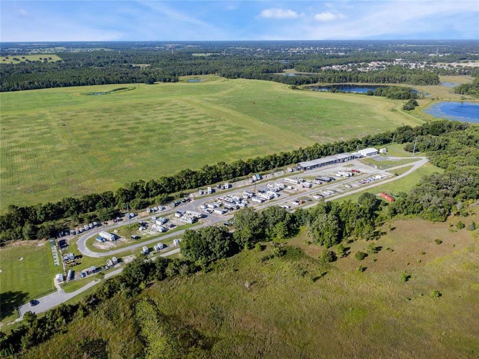 Aerial of the fenced RV-Boat Storage Lot and partial view of the golf driving range