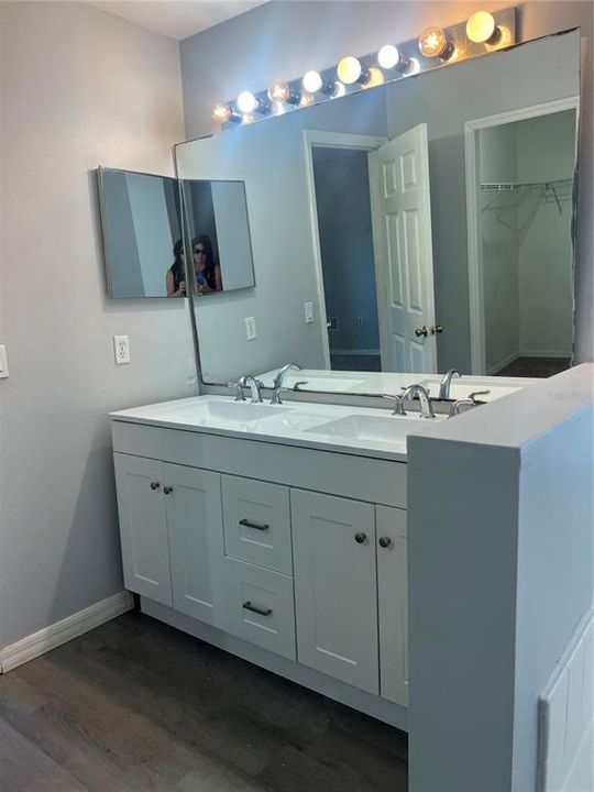 Primary Bathroom: Garden tub separate shower and double sinks