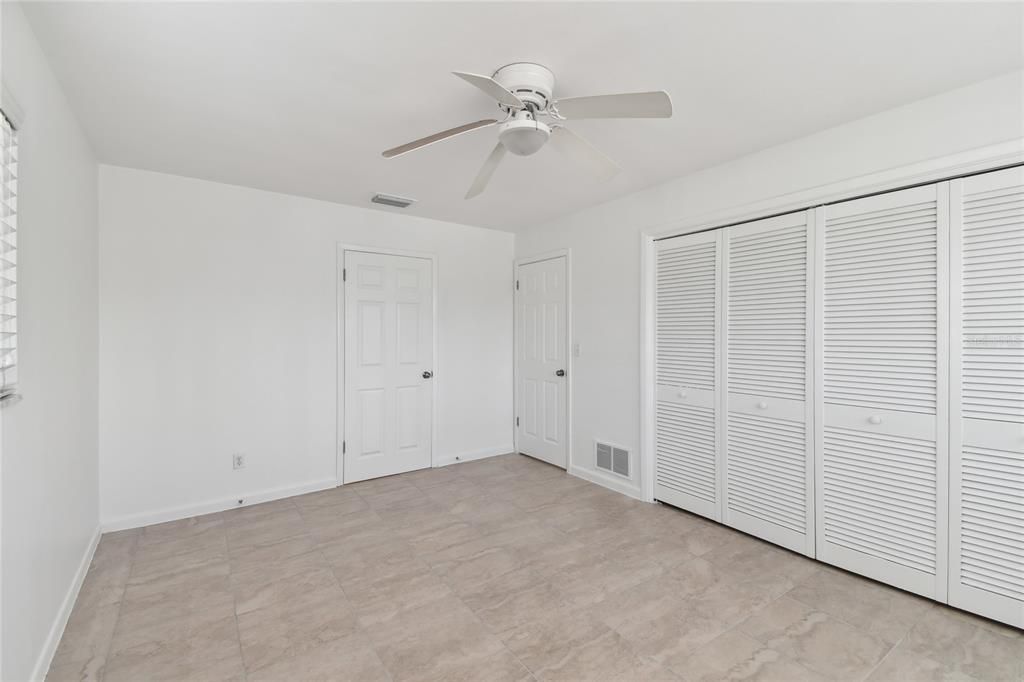 Tile floors run through bedrooms as well