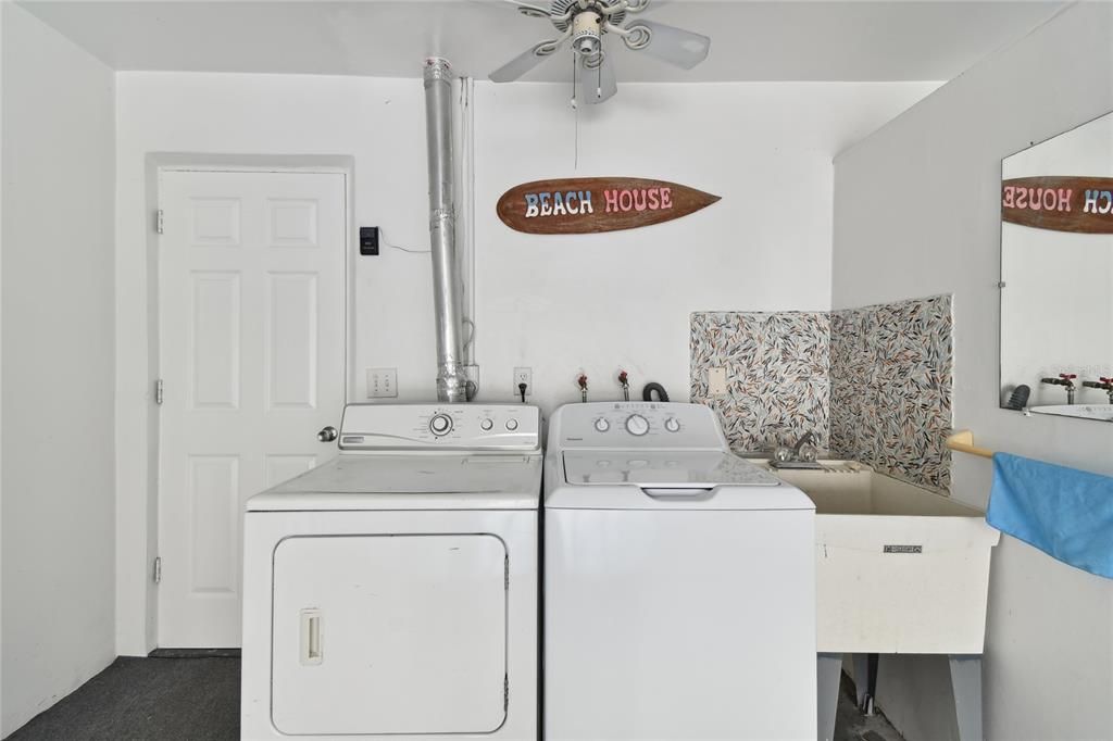 Washer, dryer included as well as laundry sink