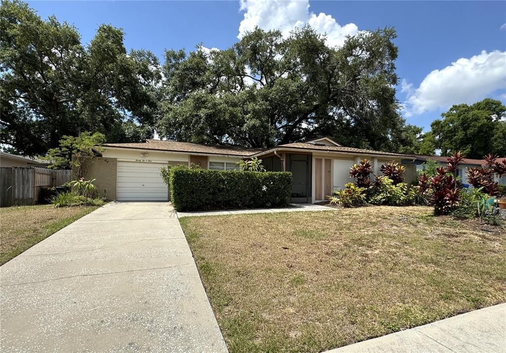 FRONT OF HOUSE WITH GARDEN AREA