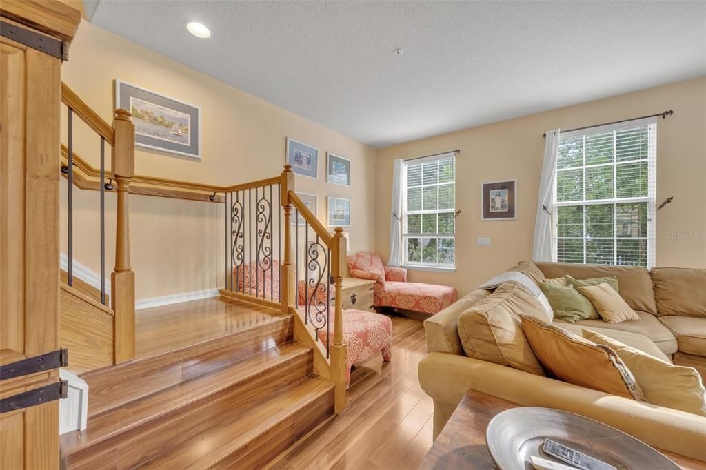 Gorgeous stairways with upgraded wrought iron railings. And there's plenty of natural light light.