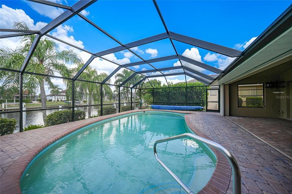 Heated Pool/Hurricane Shutters. New Tile Roof to be Installed end of July