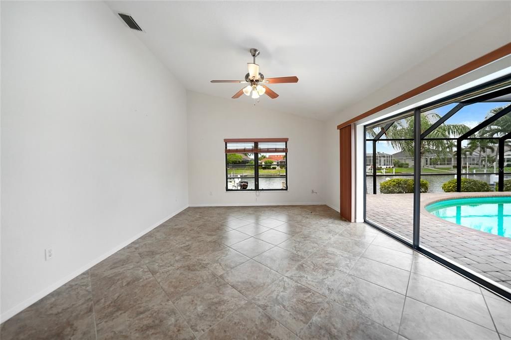 Family Room-Sliders towards Paved Newly Screened in Lanai and Pool