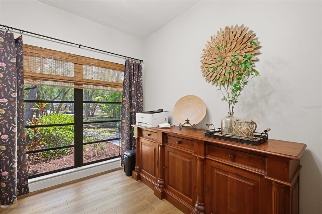 Large windows in office that make it so bright and happy