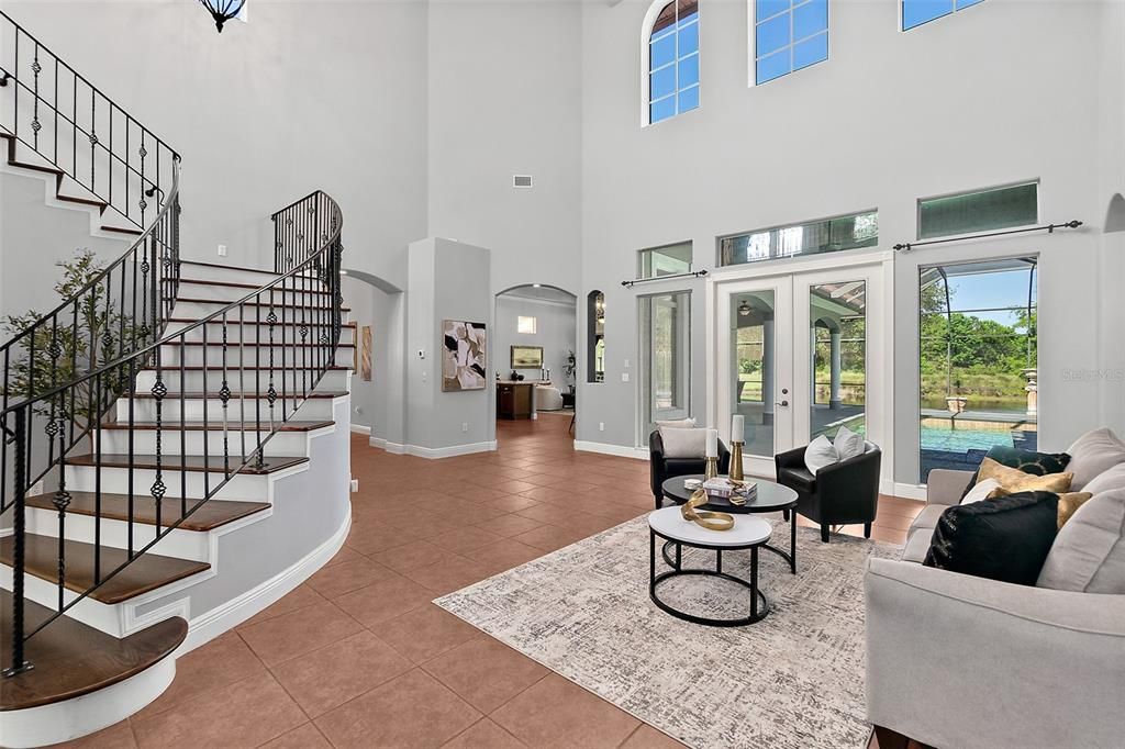 Living Room w/Windows for Natural Light & Tile Floors