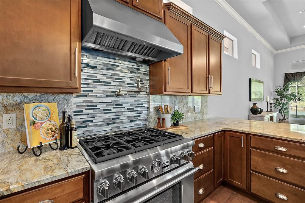 Granite Countertops w/Backsplash & Gas Range w/Pot Filler