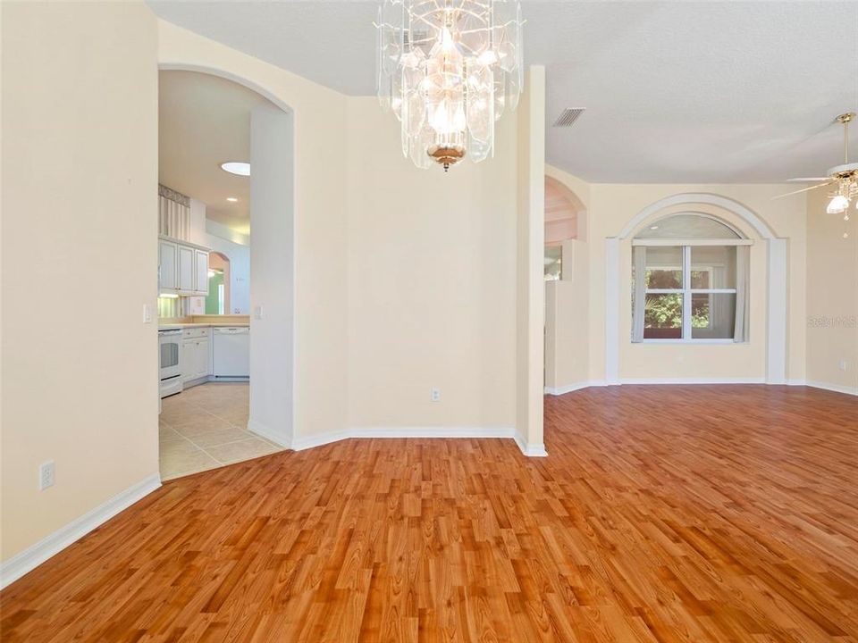 View from Dining room into kitchen and Living room