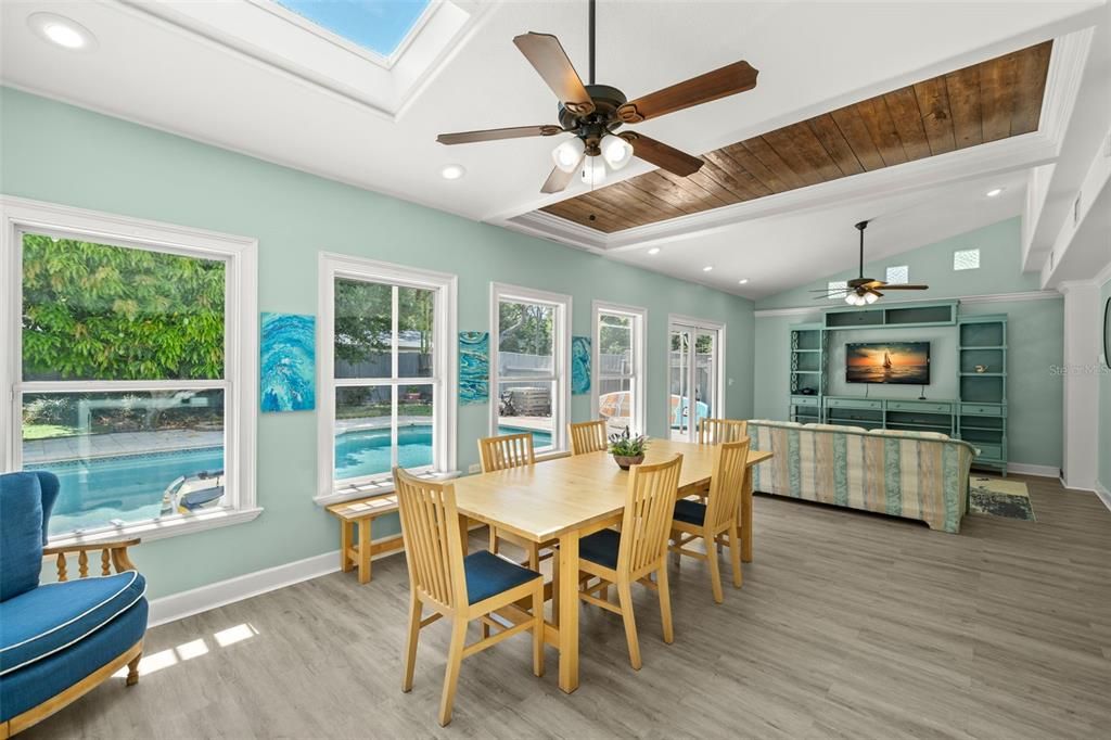 Dining room and family room overlooking pool/yard